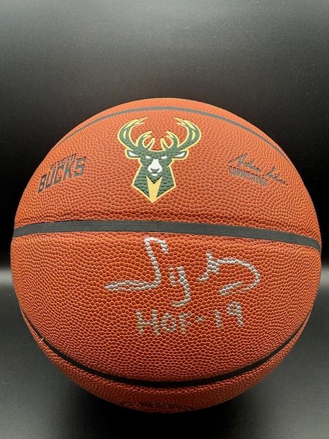 Sidney Moncrief Signed and Inscribed Bucks Basketball - Curators Corner LLC