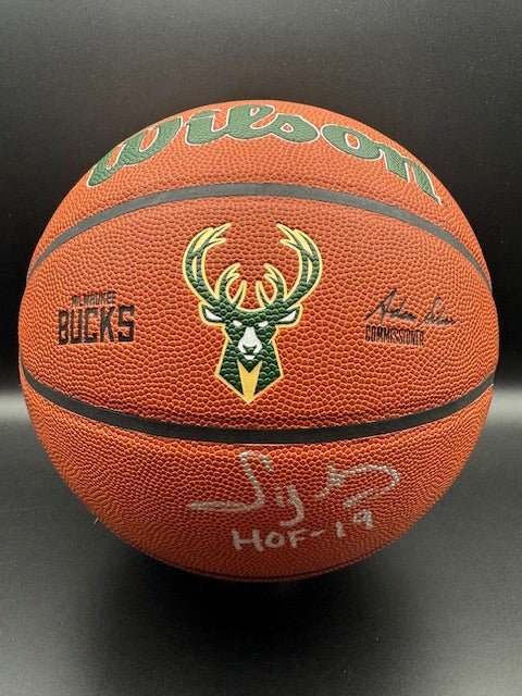 Sidney Moncrief Signed and Inscribed Bucks Basketball - Curators Corner LLC