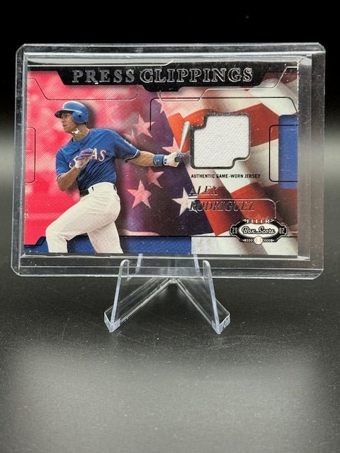 2002 Fleer Press Clippings Game Worn Jersey Piece Alex Rodriguez - Curators Corner LLC